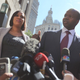 Diallo and her lawyer after being told of dismissal motion (Getty Images)